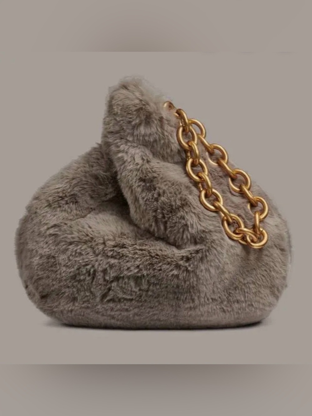 Donna Karan Lawerence Faux Fur Wristlet. Cloud.